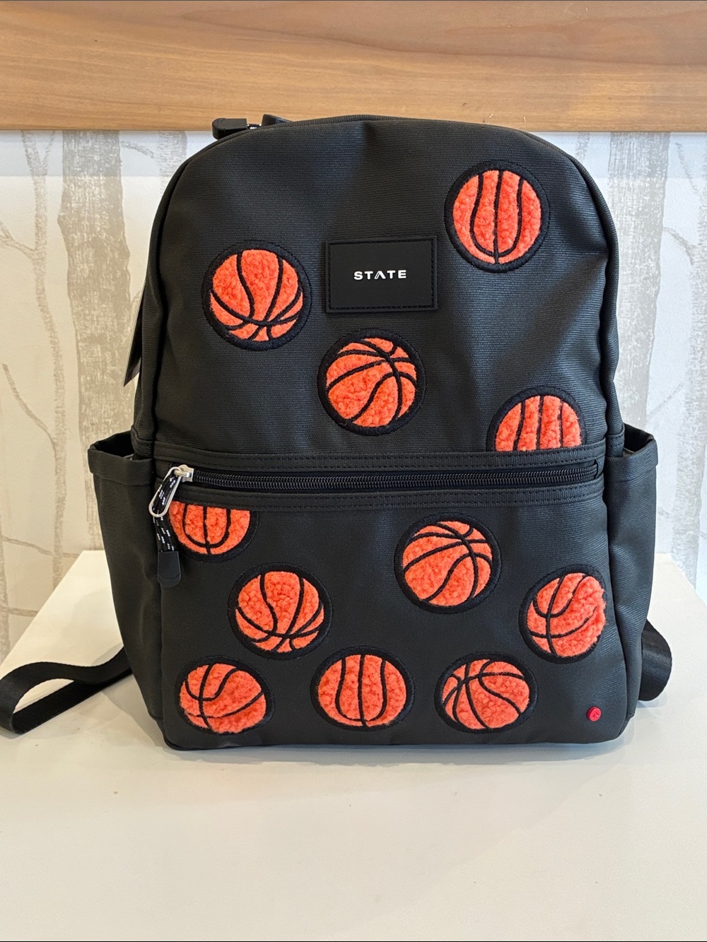 STATE Black Backpack with Orange Basketball Patch Design